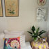 Linen cushion and older Angel canvas in a bedroom in Port Vila, Vanuatu